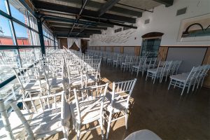 Factoria space with white chairs